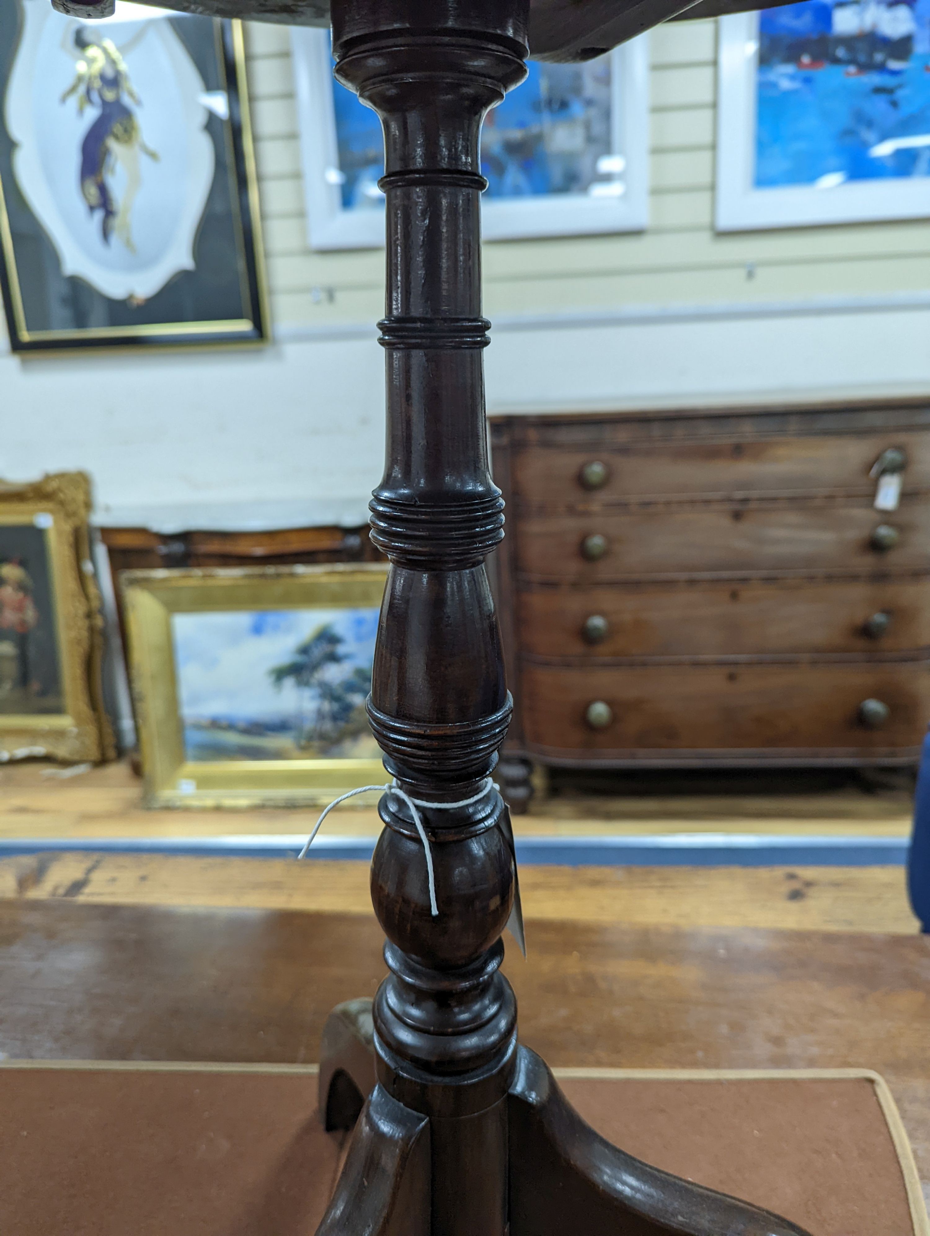 A 19th century circular mahogany tripod wine table, diameter 50cm, height 66cm